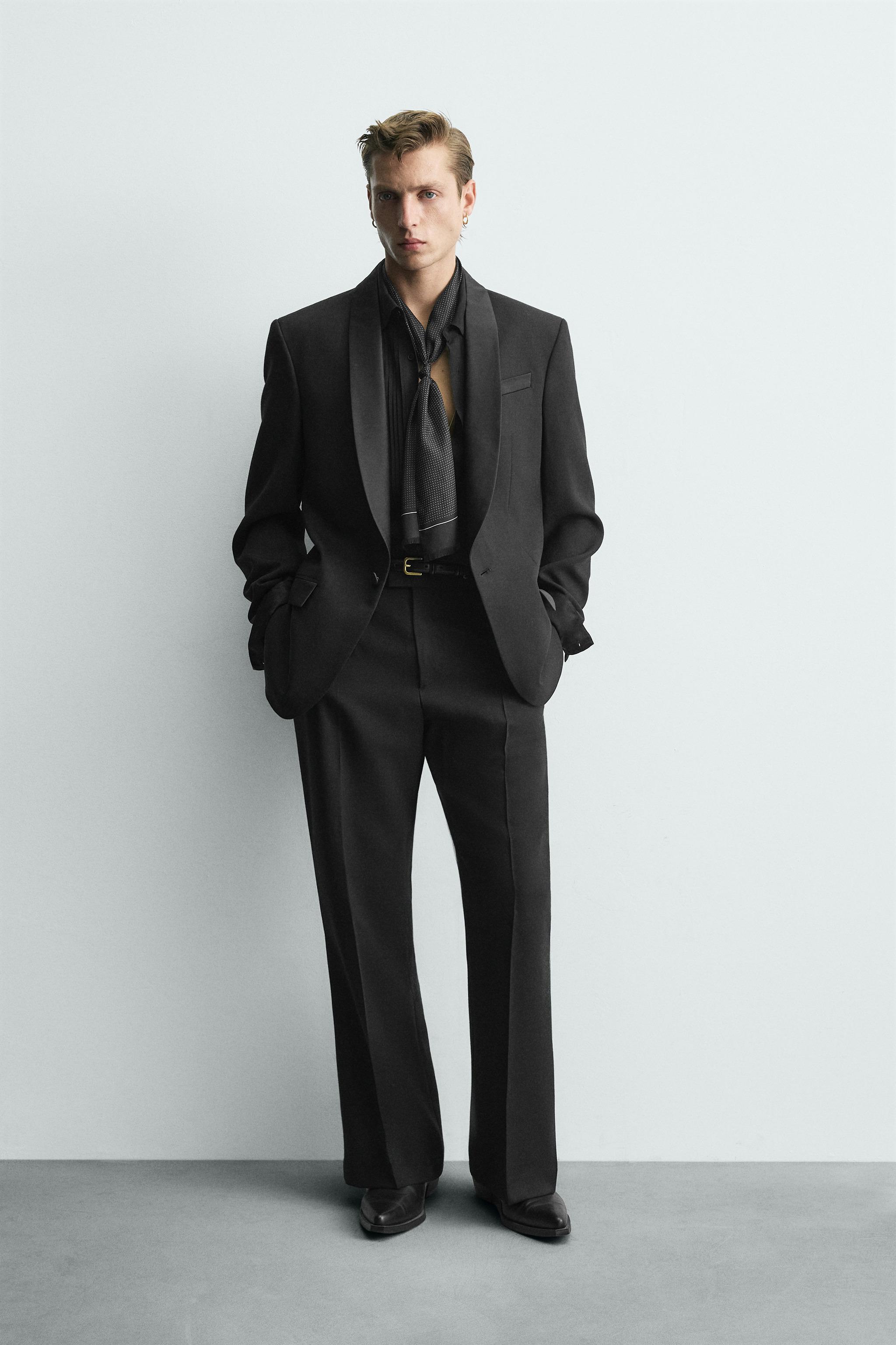 LIMITED EDITION WOOL FLARE FIT SUIT PANTS